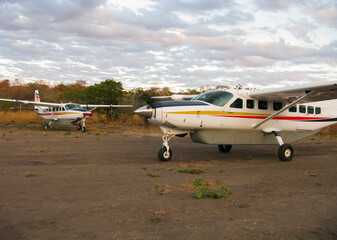 africa, selous. plane preparing for takeoff.