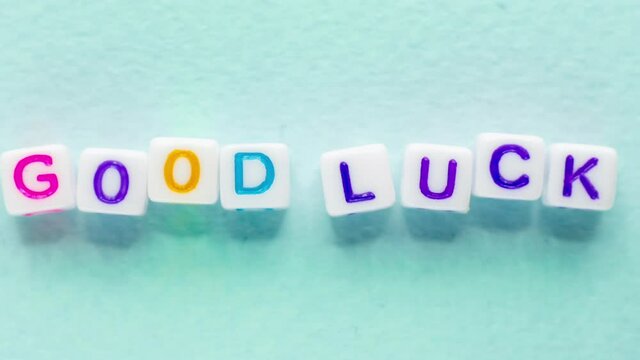 good luck text success wish gif cubes letters blue