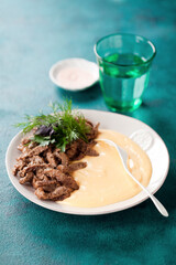 Homemade Beef Stroganoff with cauliflower mashed, selective focus