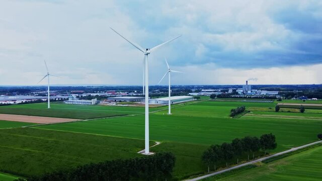 Aerial drone footage of wind turbines in The Netherlands, Green landscape with wind turbines, Dutch wind turbines 