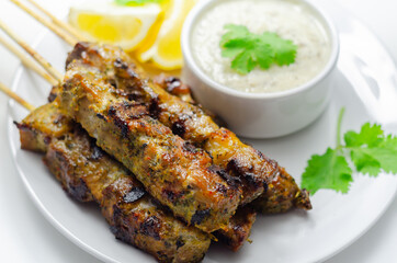 Pork shoulder kebabs with a lemon and herb rub and a garlic and mint yogurt sauce