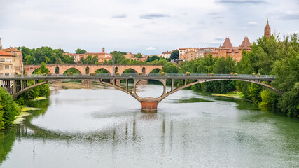 Fototapeta premium Montauban, beautiful French city in the South, old bridges on the river Tarn 