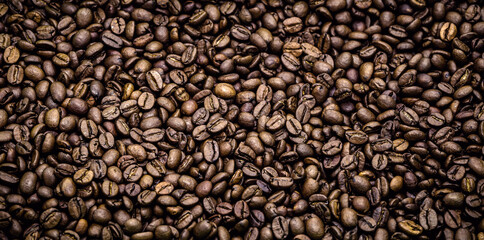 coffee texture with roasted Brazilian coffee seeds