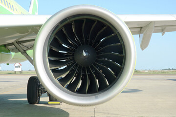  Close-up view of the aircraft engine standing in the parking lot of the liner.