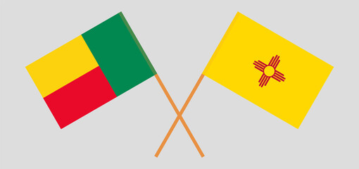 Crossed flags of Benin and the State of New Mexico. Official colors. Correct proportion