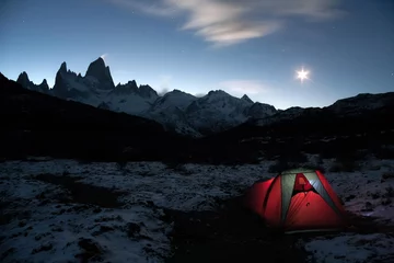 Photo sur Plexiglas Fitz Roy Night camping at the base of Cerro Fitz Roy under the moonlight. El Chalten Patagonia Argentina. Freedom adventure concept