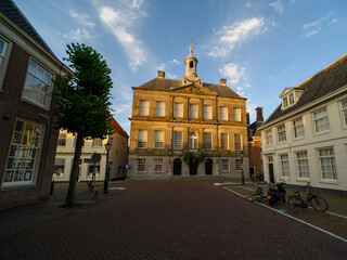 Fototapeta na wymiar The old town hall on a summer evening in Weesp