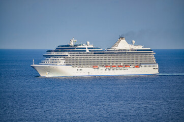 Cruise ship out at sea on clear day