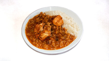 Carapulcra de Pollo, Peruvian food based on dried potatoes, pork or chicken, spices such as ají panca, onion, garlic, pepper, cumin.