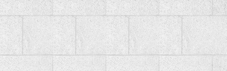 Panorama of White granite tiled wall with vintage pattern texture and background seamless
