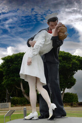 Famous kissing sailor of 1945 sculpture in the Bob Hope Memorial Park opposite the USS Midway in San Diego, California