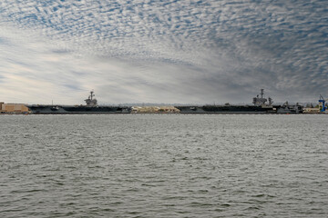 Two US Navy aircraft carriers at the Pacific Fleet Naval base on Coronado Island off the coast of San Diego, CA