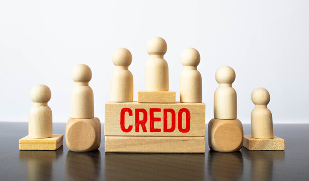 Word credo. Wooden small cubes with letters isolated on white background with copy space available.