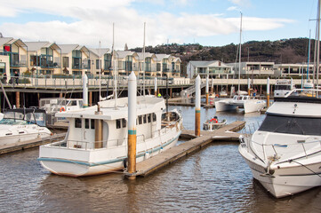 Launceston, Tasmania, Australia - September 14, 2017: Mooring boats in the Alexandra Walk Marina on the North Esk River