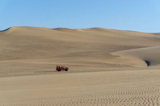 A buggy car on desert in Ica, Peru. taking buggy car is popular adventure for tourist.