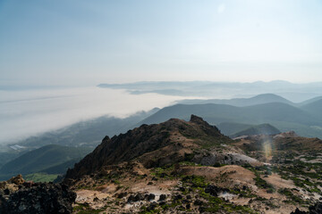 Fototapeta na wymiar 北海道函館市の恵山を登山する風景 Scenery of climbing Mt. E in Hakodate, Hokkaido.