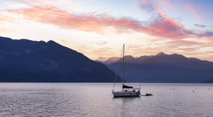 Canadian Nature Mountain Landscape Background with Sailboat. Sunny Evening. Sunset Sky Art Render. View of Howe Sound, between Squamish and Vancouver, British Columbia, Canada.