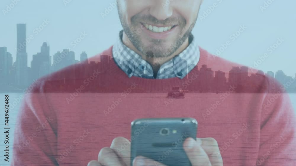 Poster digital composition of mid section of caucasian man smiling while using smartphone against cityscape