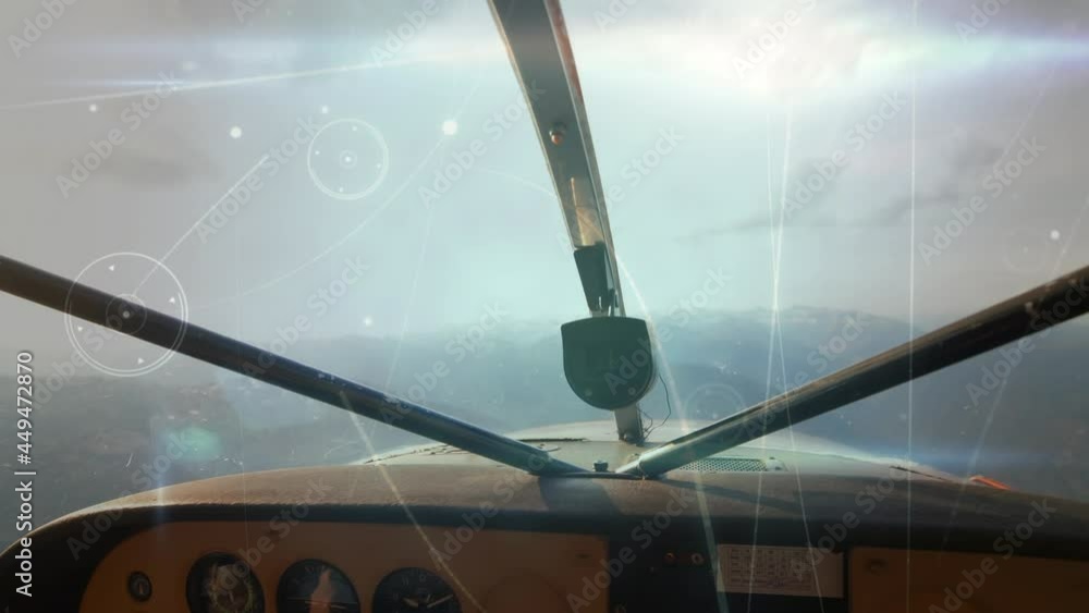 Poster glowing network of connections against front view of dashboard of private aircraft