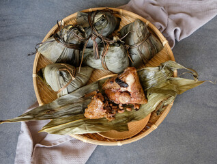 Eaten during the Duanwu festival. Zonzi aka Chinese Rice Dumplings. Wrapped in bamboo leaves with generous fillings of pork, mushrooms, salted egg yolk, chestnut, dried shrimps and glutinous rice.