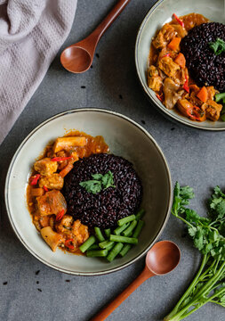 Homemade Vegetarian Meals. Vegan Massaman Curry With Black Rice. Delicious And Healthy Ideal For Weight Watcher, On Diet Or Light Eater Or People Who Observed Going Meatless In A Day Or Two Per Week.