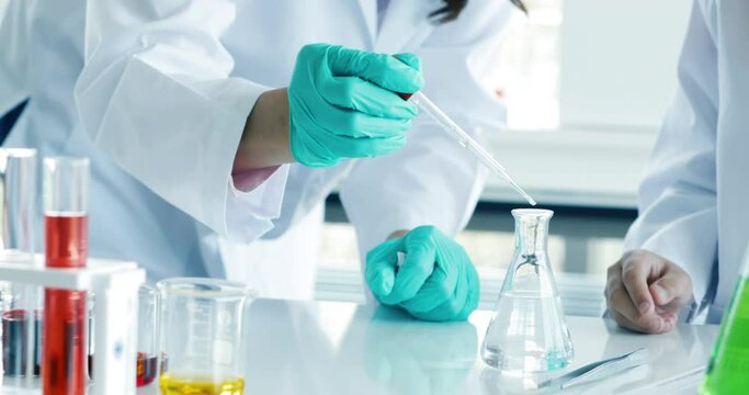 Title
Young kid wearing eyeglasses in doctor gown dress using microscope as little scientist in school laboratory with fun and happy. Concept of schoolboy learning and studying.
Young kid wearing eyeg