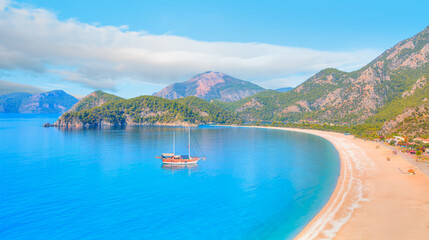 Brown gulet anchored  - Panoramic view of Oludeniz Beach And Blue Lagoon, Oludeniz beach is best...