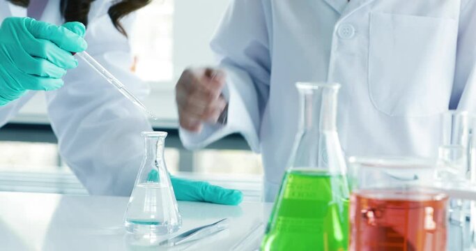 Title
Young kid wearing eyeglasses in doctor gown dress using microscope as little scientist in school laboratory with fun and happy. Concept of schoolboy learning and studying.
Young kid wearing eyeg