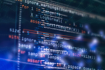 Notebook closeup photo. CSS, JavaScript and HTML usage. Monitor closeup of function source code.