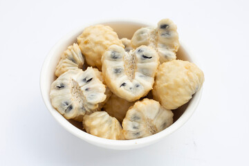 Custard apple in white bowl on white background.