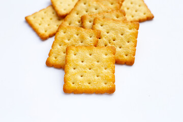 Dry cracker cookies on white background.