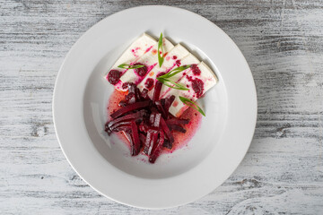 Boiled beet salad with soft feta cheese and sauce
