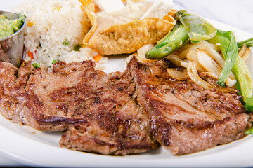 vegetables on a plate, seafood, avocadoes, rice, steak, soup