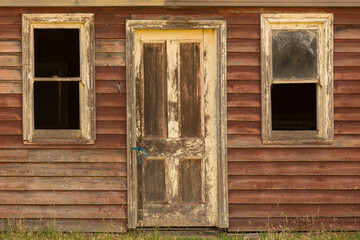 Fototapeta na wymiar Close up of abandon farm timber cottage