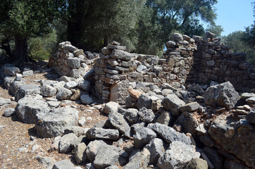 Fototapeta na wymiar Ruins of the antcient greek city, Kedrai, Sedir island,Gulf of Gokova, Aegean Sea, Turkey