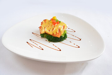 grilled bbq cod fish fillet with sweet honey mango mayonnaise sauce with mixed fruits in white background asian halal seafood menu