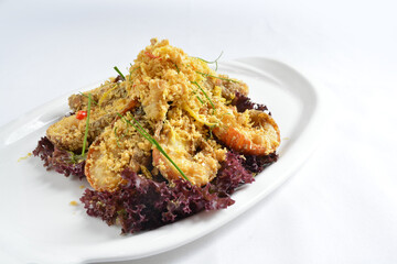 stir fried crayfish prawn seafood with butter spicy cereal milk sauce taste in white background asian halal seafood menu