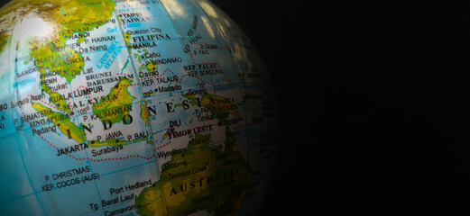 Indonesia globe on black background. Complete with copy space for text needs.