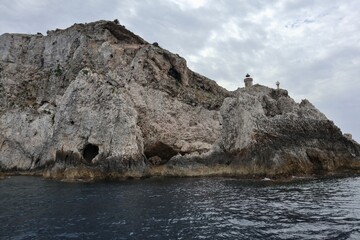 Fototapeta na wymiar Isole Tremiti - Scorcio del faro da Cala del Bue Marino