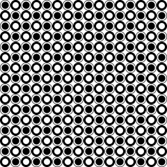 Back to back circles in checker position. Vector black and white repeated dots. Seamless chess balls or circles.