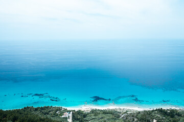 View from above on beautiful coast with aqua blue water Lefkada Ionian island, Greece.