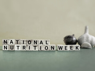 National nutrition week text background. Celebration day concept. Stock photo.