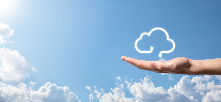 Businessman hold cloud icon.Cloud computing concept - connect smart phone to cloud. computing network information technologist with smart phone.Big data Concept.