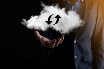 Cloud technology. Polygonal wireframe cloud storage sign with two arrows up and down on dark ....