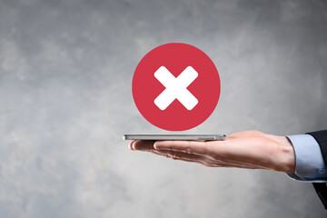 Hand holds icon,cancellation symbol,cancel icon.Cross mark flat red icon.round X mark.cancel...