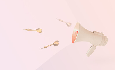 Golden arrows and beige megaphone on pastel pink and beige background with copy space. Minimal,...