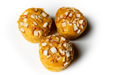 3 pieces popular and yummy traditional cake made with raw ripe palmyra palm fruit juice. Steamed palmyra palm cake in isolated white background. 