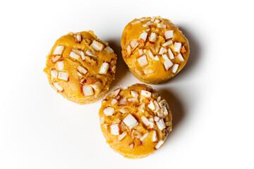 3 pieces popular and yummy traditional cake made with raw ripe palmyra palm fruit juice. Steamed palmyra palm cake in isolated white background. 