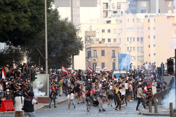 Protestors on Beirut port explosion anniversary - obrazy, fototapety, plakaty
