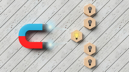 magnet attracting the hexagon with the right idea on wooden background